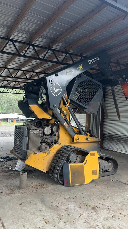 A tracked loader Reed's works on out in the field